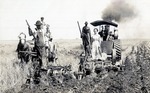 Postcard: People Pose with a Steam Plow in a Field