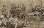 Postcard: Men Cutting and Moving Wood