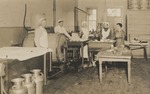Postcard: People Standing in a Blue Bell Cream Company Factory