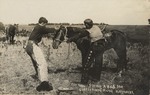 Postcard: Cowboys Fixing a Bad One