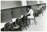 Women Sitting at Forsyth Library Study Carrels