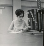 Woman Searching The Forsyth Library Periodical Index