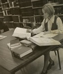 Woman Seated at a Forsyth Library Table