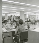 Forsyth Library Librarian Helping a Student