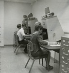 Students Using Forsyth Library Microfilm Machines