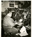 Print Shop Member Works at Typewriter - 1957