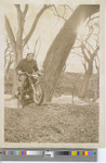 Man Riding a Motorcycle on the Bank of Big Creek