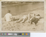 Group of Four People Sunbathing at Big Creek