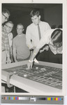 A Group of Five Male Students Playing Craps