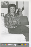 Female Student Sitting in McMindes Dorm Room
