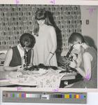 Three Students Working in a Home Economics Class