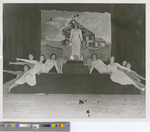 Eleven Women Dancers Pose on a Stage in Sheridan Coliseum – 50th Anniversary