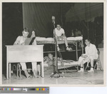 Four Men Performing a Skit in Sheridan Coliseum at Fort Hays State College 1950s