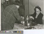 1950s Photograph of Three Women at a Reception in the Applied Arts Building During Homecoming Week