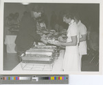 A Line of Men and Women Going through a Buffet Line at Fort Hays Kansas State College in the 1970s.