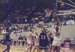 Deb Smith Reaches for Rebound Ball by Fort Hays State University Athletics