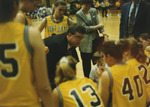 Coach Discussing Plays by Fort Hays State University Athletics