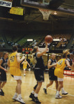 Opposing Player Attempts Layup by Fort Hays State University Athletics