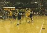 Player Surrounded by Opposing Team by Fort Hays State University Athletics
