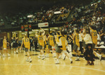 Team Cheering After Win by Fort Hays State University Athletics