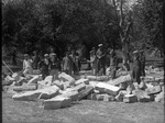 Men Standing on Limestone Blocks at Camp Phillips