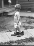 Wooster Child Wearing Adult Shoes by Lyman Dwight Wooster